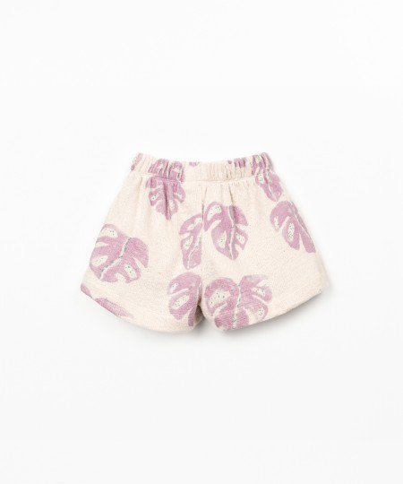 Pantalón corto con estampado de monstera