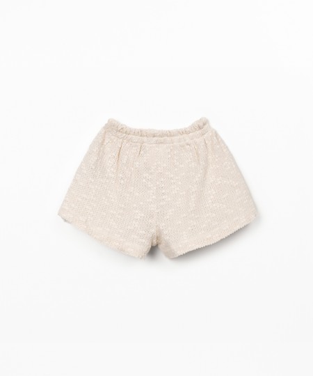 Pantaloncini in maglina con effetto crochet