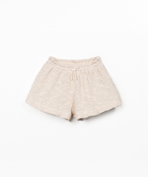 Jersey shorts with crochet effect