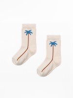 Calcetines de algod�n org�nico con estampado de palmeras.