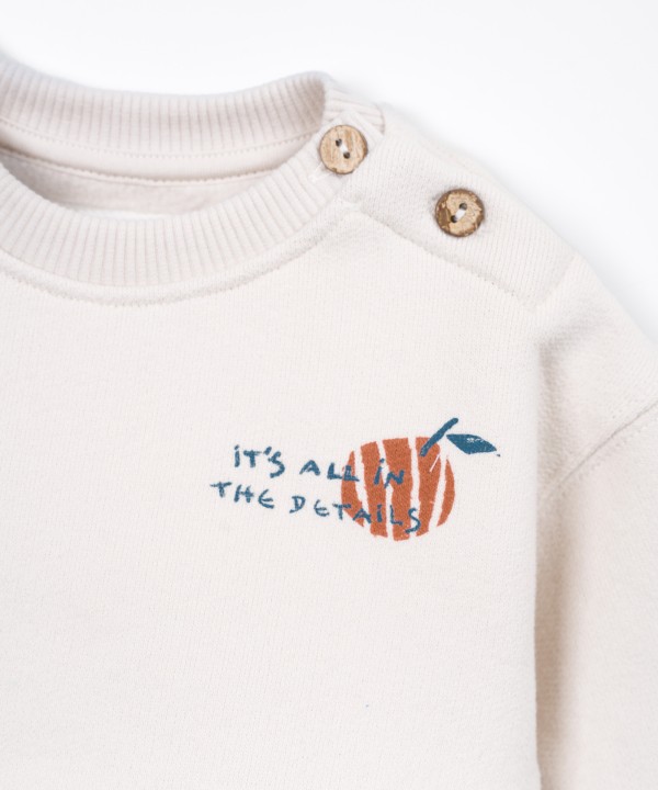Knitted sweater with interior carding