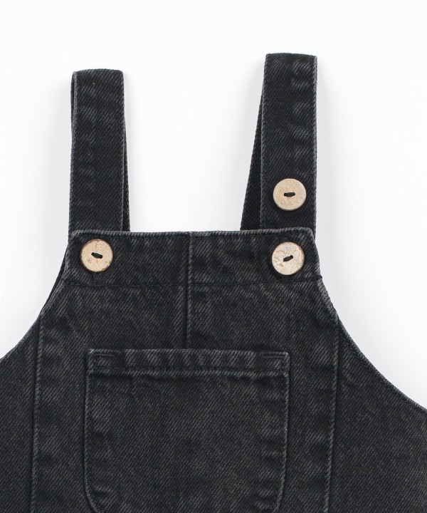 Salopette in denim con tasca