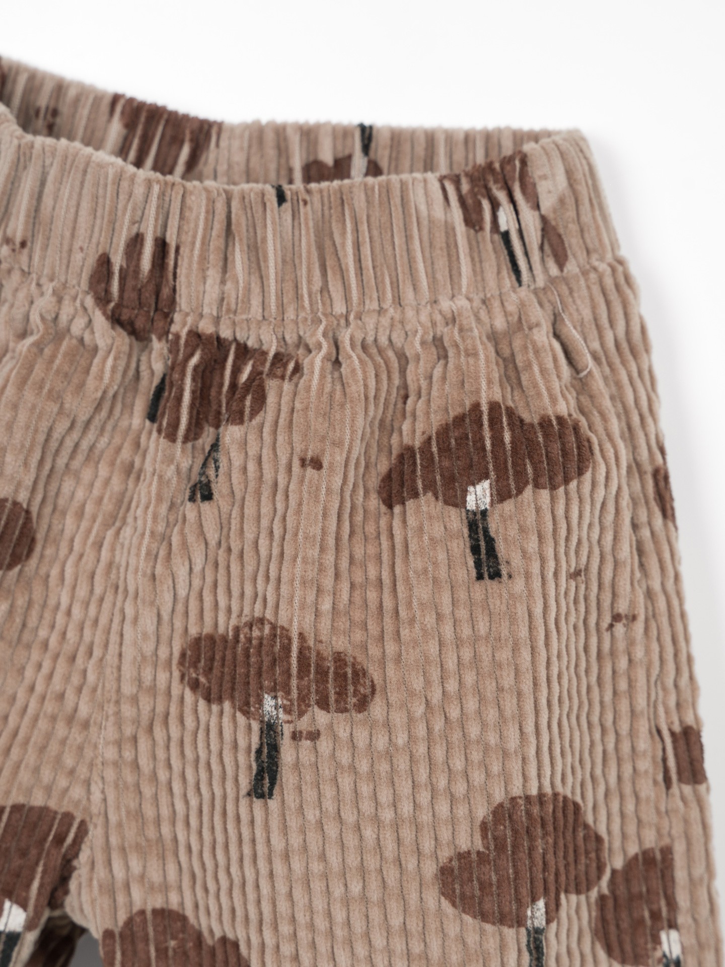 Pantalon en velours côtelé avec imprimé