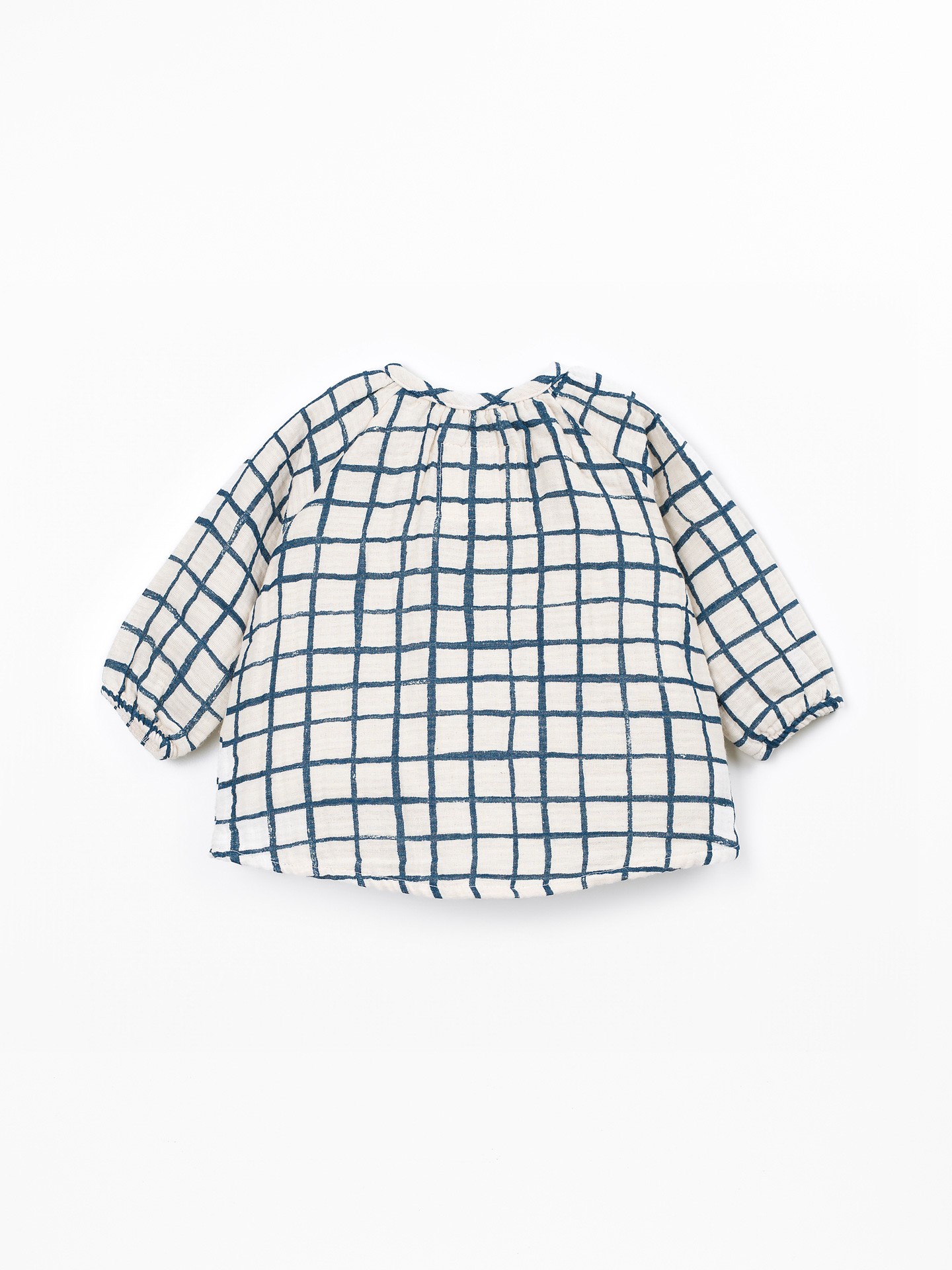 Blouse en tissu avec imprimé à carreaux