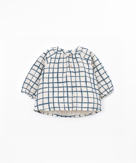 Blusa de tecido com estampado xadrez
