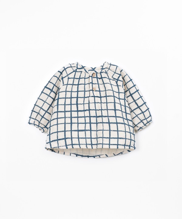 Blusa de tecido com estampado xadrez
