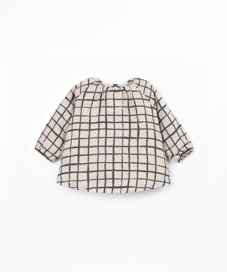 Blouse en tissu avec imprimé à carreaux