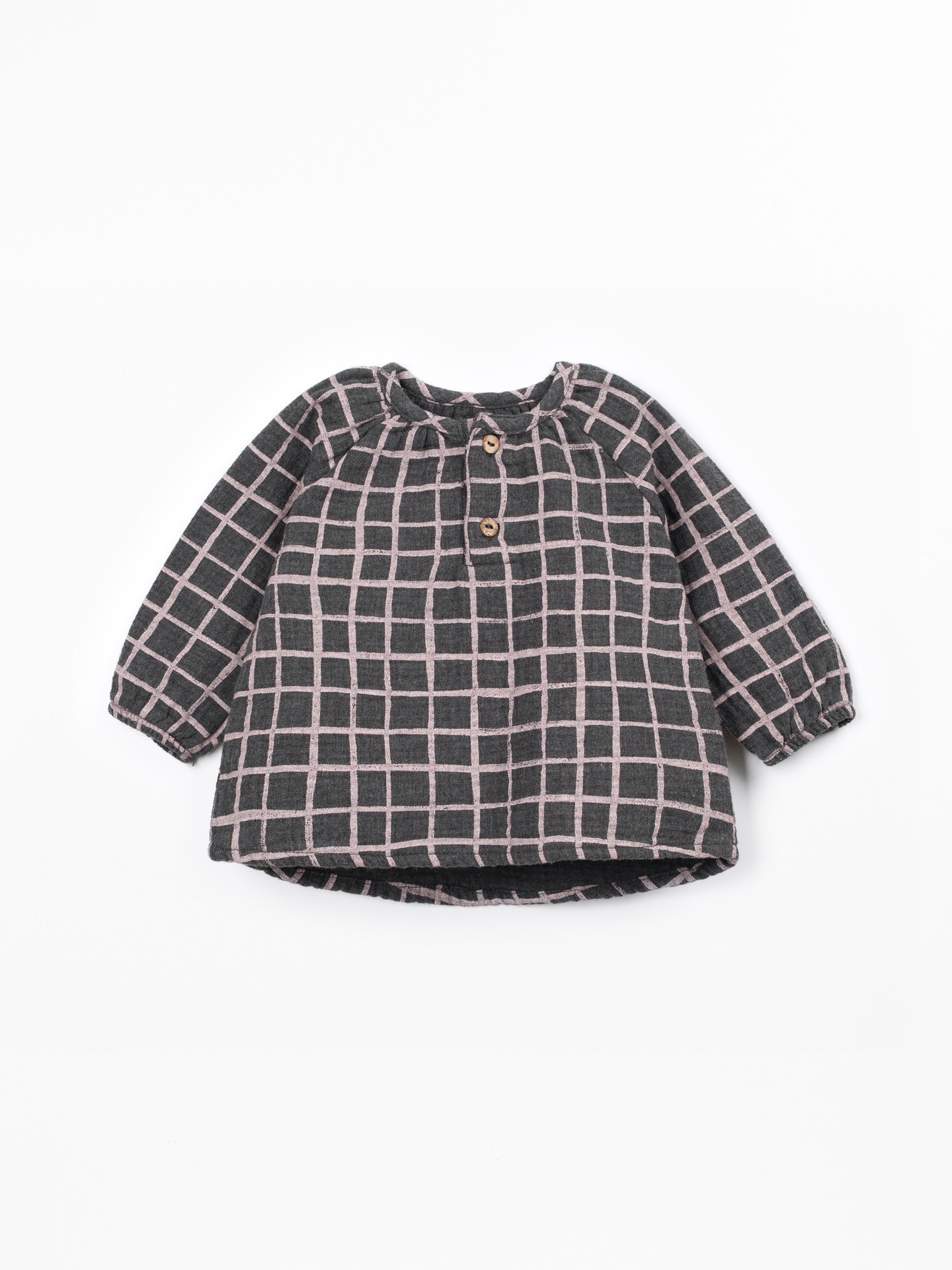 Blouse en tissu avec imprimé à carreaux