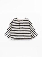 Knit sweater with a blend of natural fibers and recycled cotton