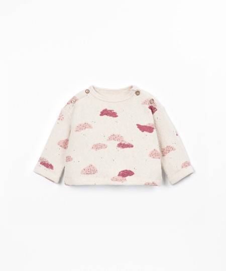 Knit sweater with a blend of natural and recycled fibers