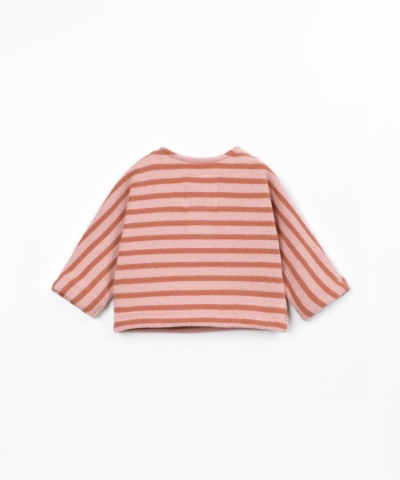 Knit sweater with a blend of natural fibers and recycled cotton