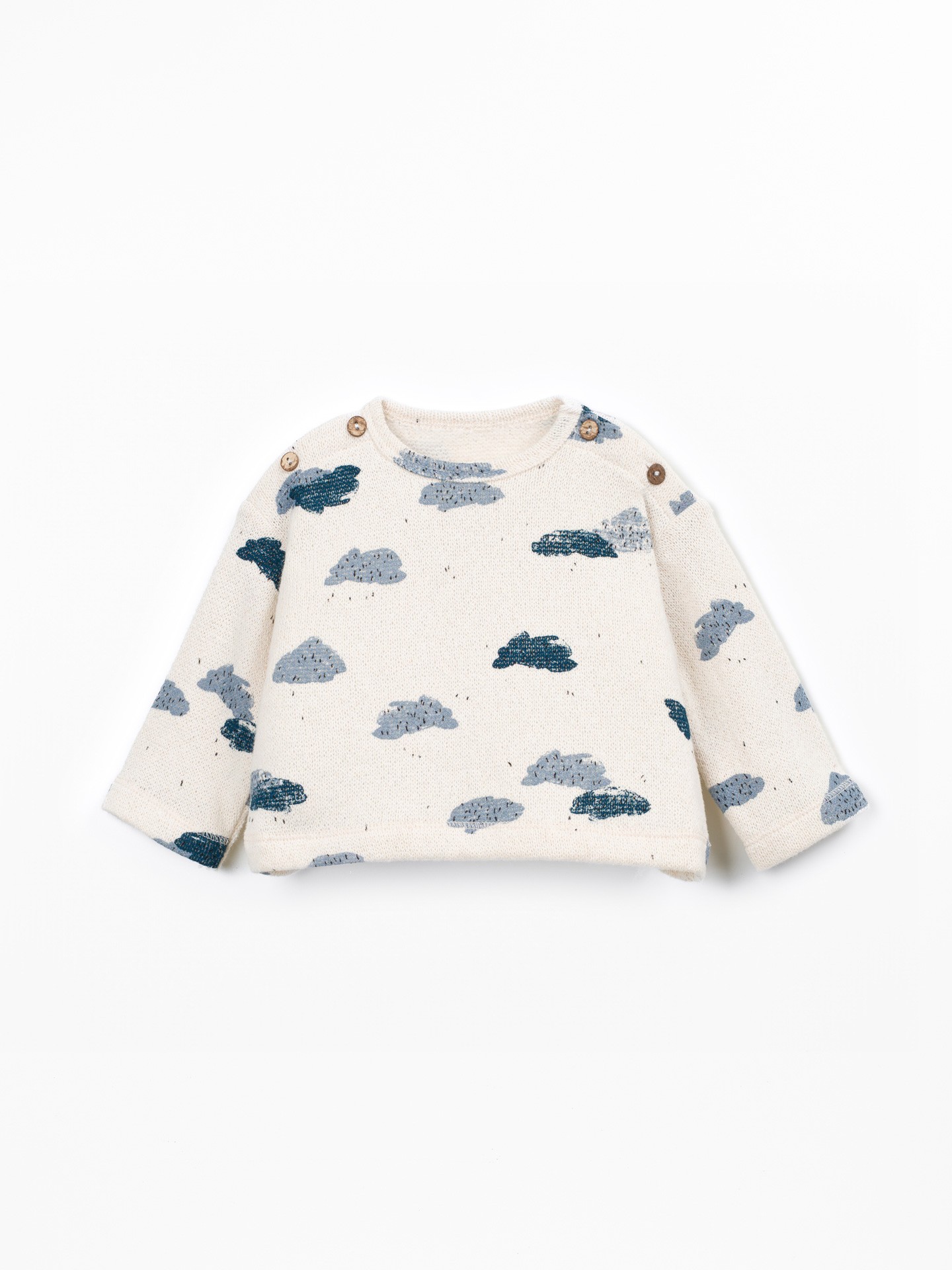Knit sweater with a mix of natural and recycled fibers