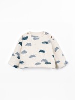 Knit sweater with a mix of natural and recycled fibers