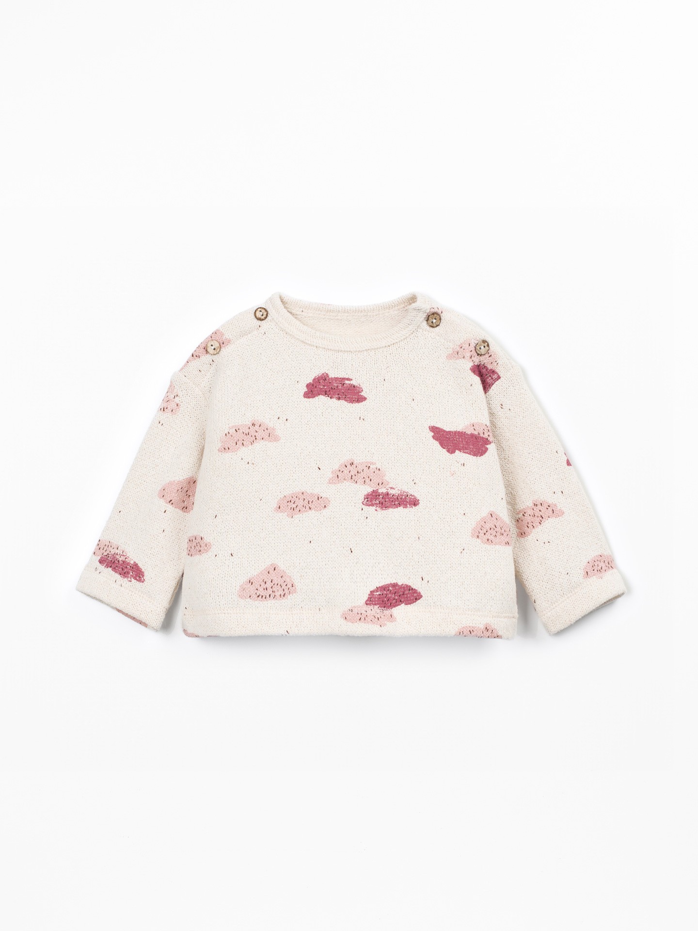 Knit sweater with a blend of natural and recycled fibers