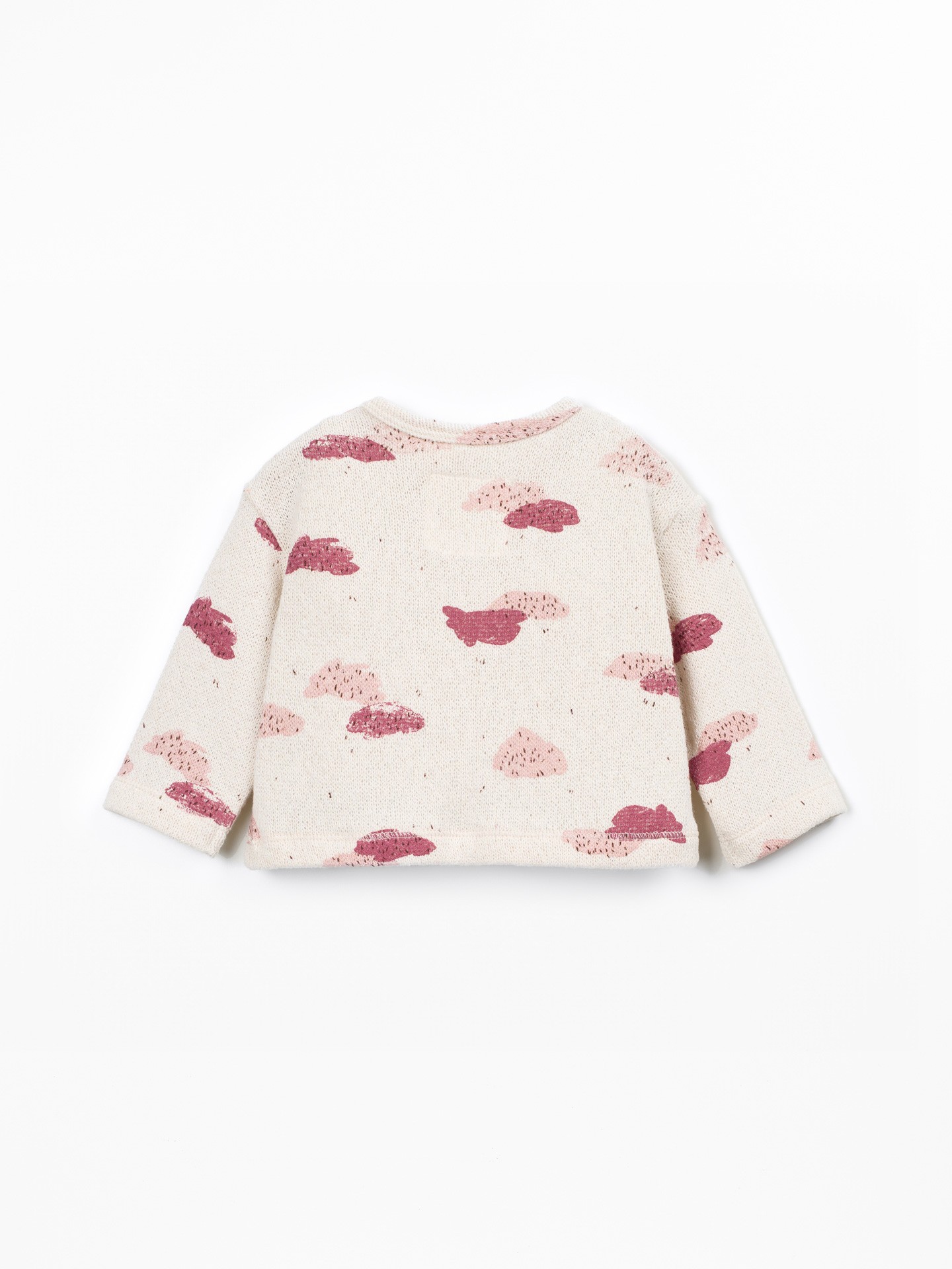 Knit sweater with a blend of natural and recycled fibers