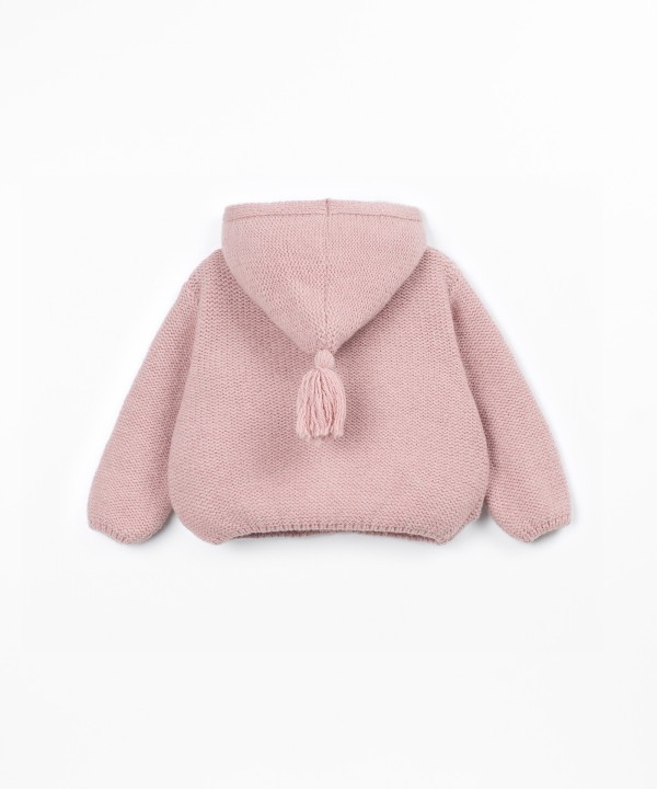 Knitted coat with front opening