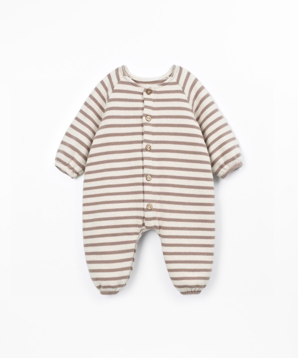 Knit jumpsuit with a mixture of natural and recycled fibers
