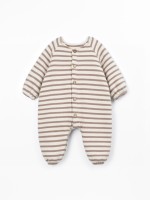 Knit jumpsuit with a mixture of natural and recycled fibers Knit jumpsuit with a mixture of natural and recycled fibers