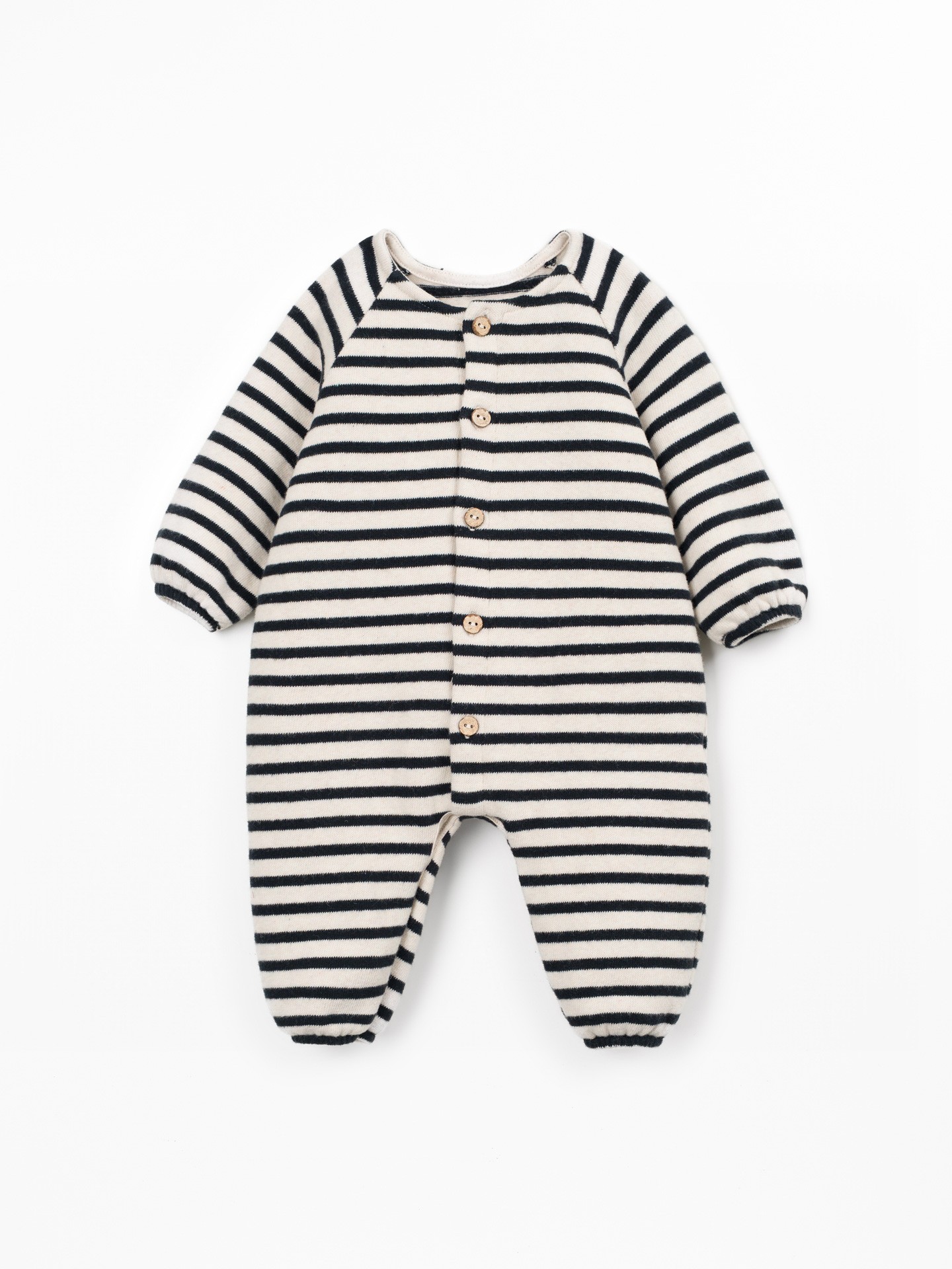 Knit jumpsuit with a mixture of natural and recycled fibers