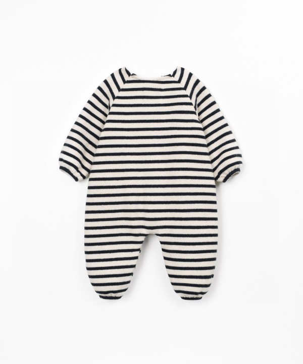 Knit jumpsuit with a mixture of natural and recycled fibers