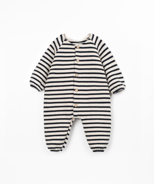 Knit jumpsuit with a mixture of natural and recycled fibers