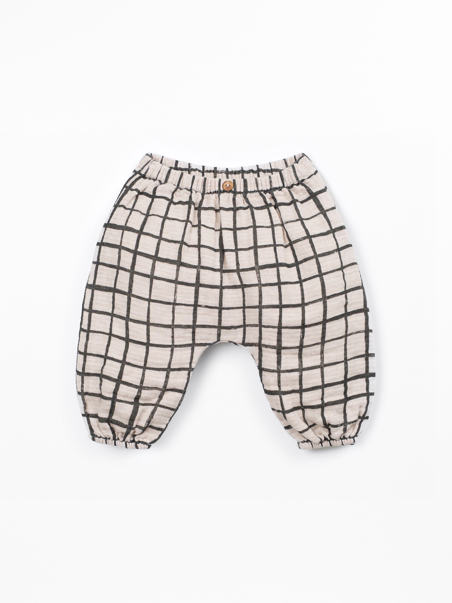 Pantalon en tissu avec motif à carreaux