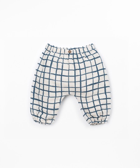 Pantalon en tissu avec motif à carreaux