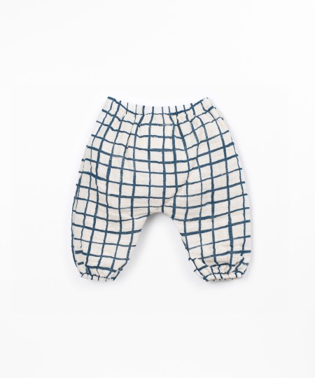 Calça de tecido com padrão xadrez
