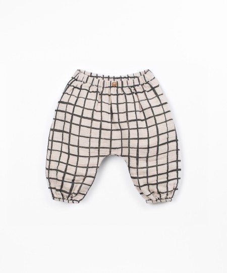 Fabric trousers with checkered pattern