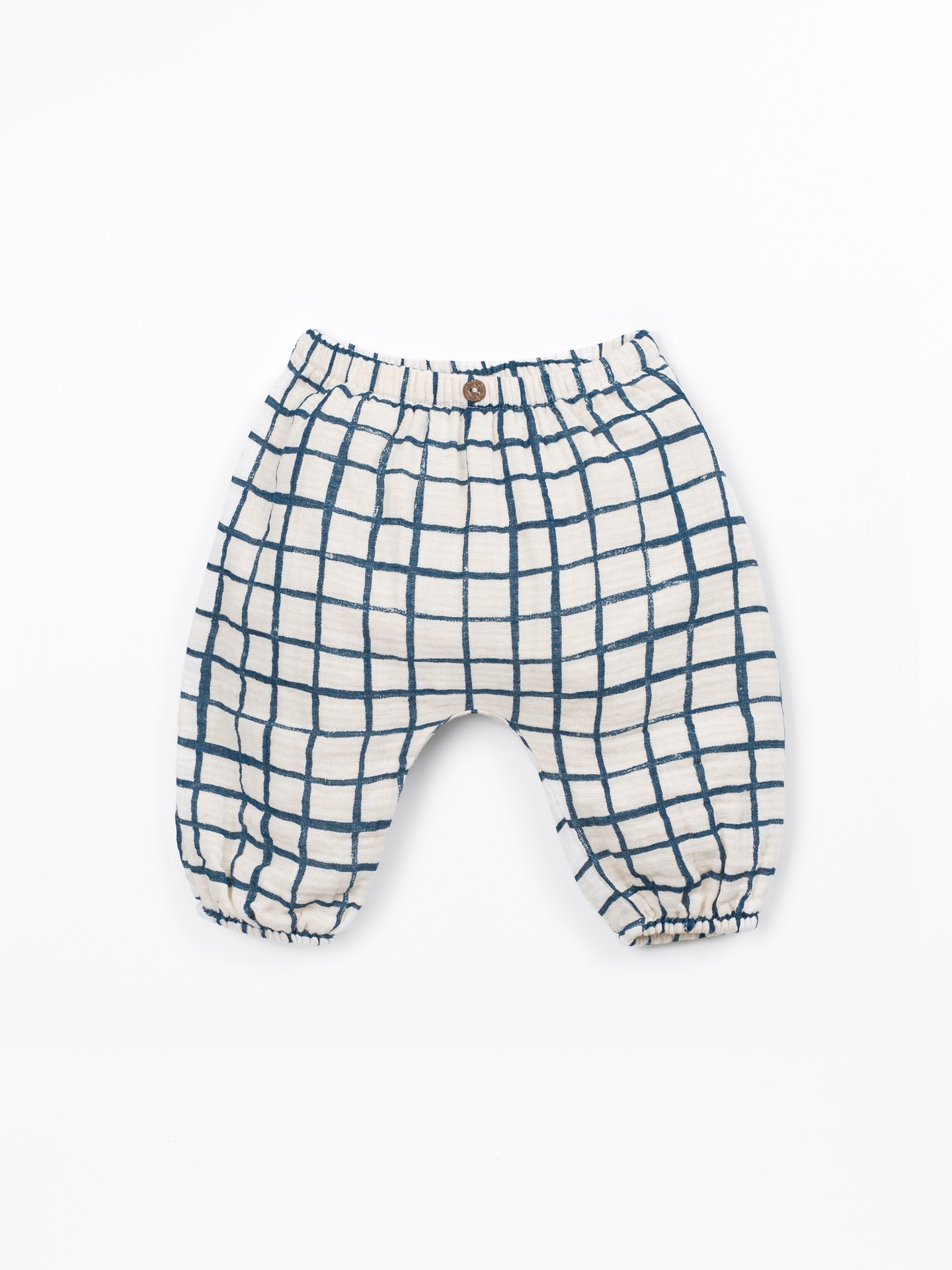 Pantalon en tissu avec motif à carreaux