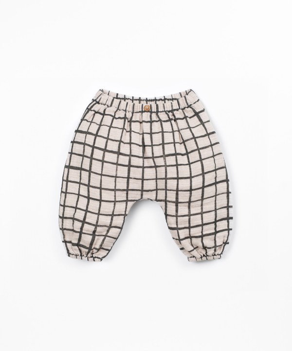 Fabric trousers with checkered pattern