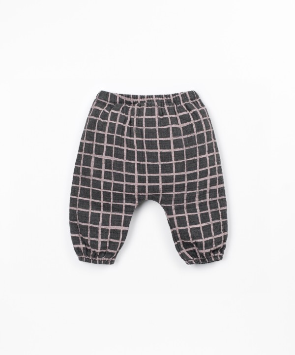 Fabric trousers with checkered pattern