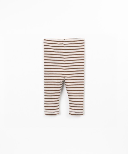 Striped leggings with decorative coconut buttons