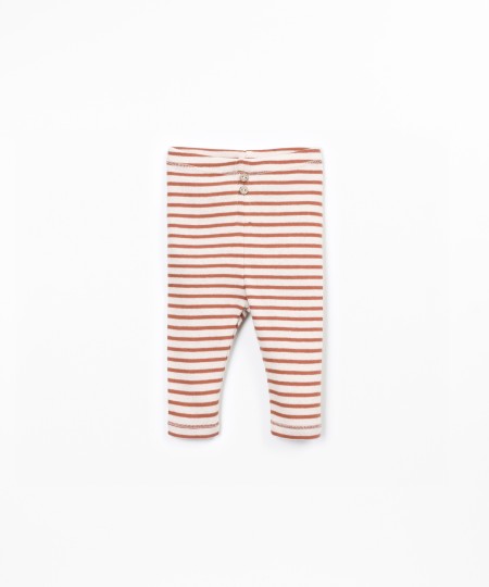 Striped leggings with decorative coconut buttons