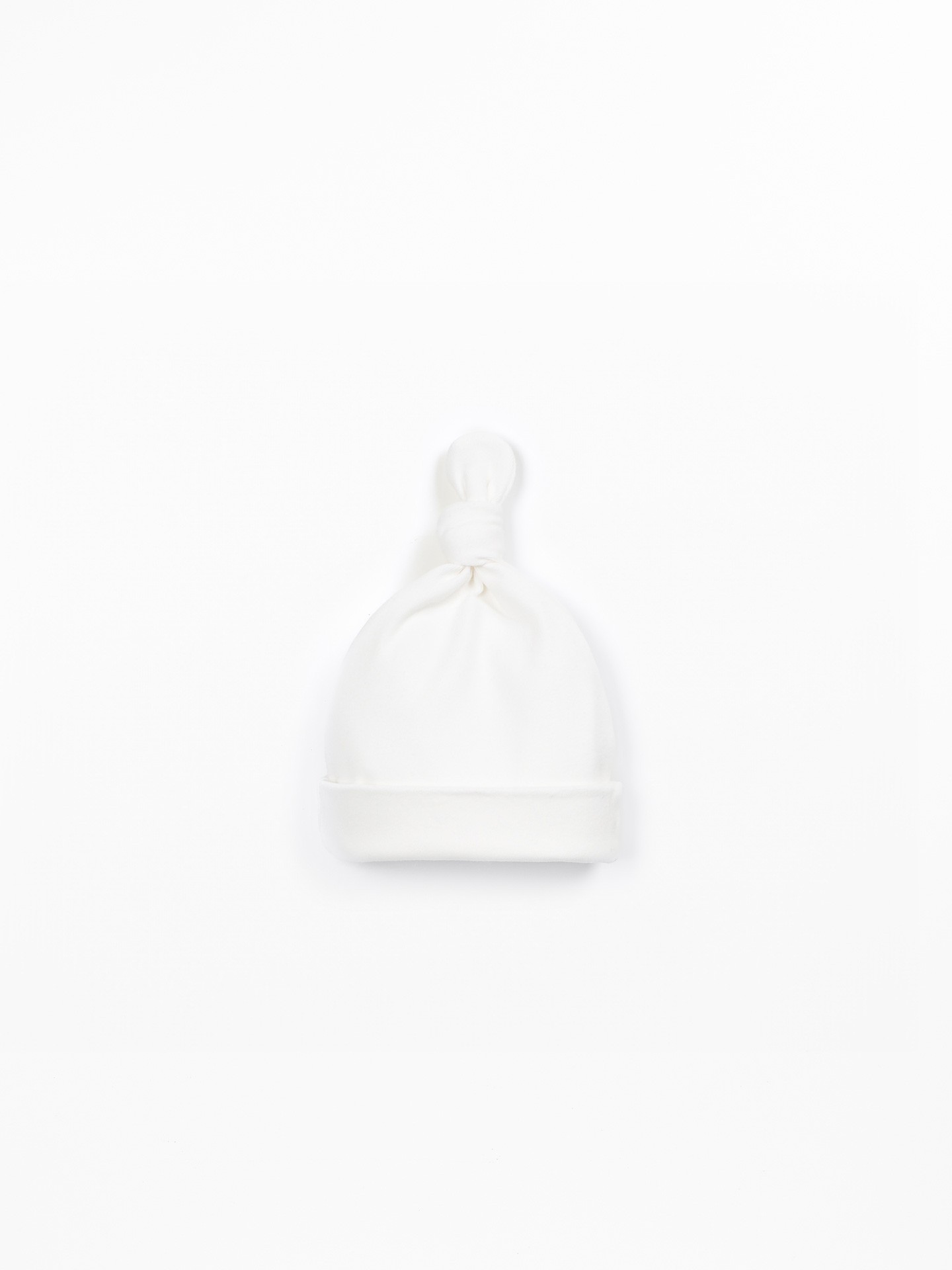 Bonnet en maille avec n?ud d�coratif