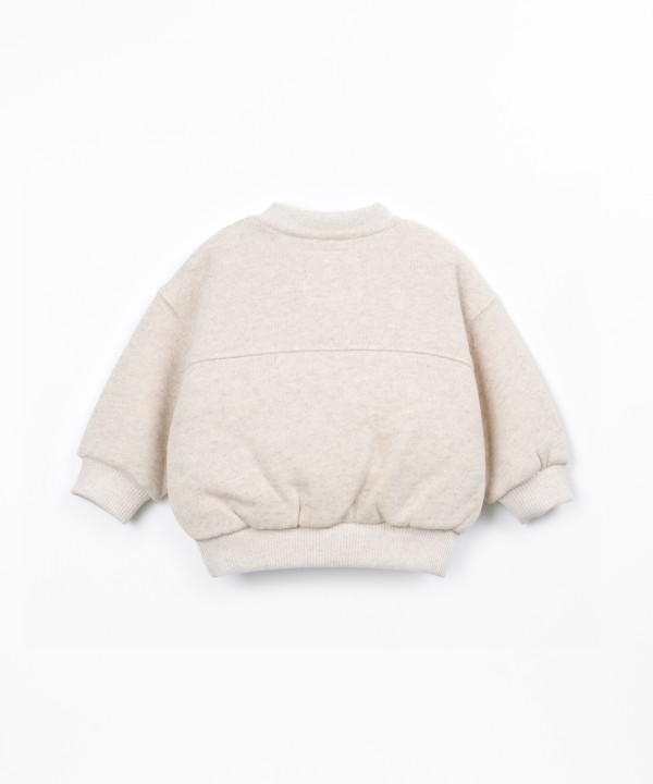 Knit sweater with recycled cotton