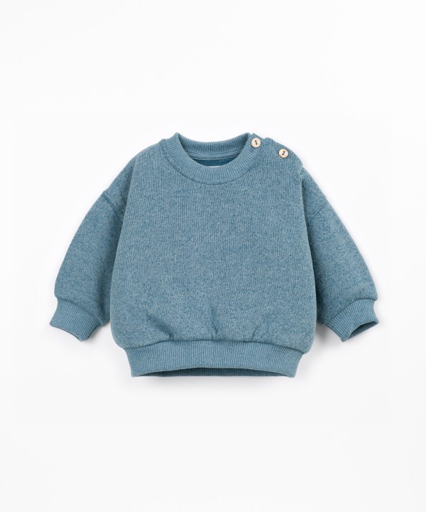 Knit sweater with recycled cotton