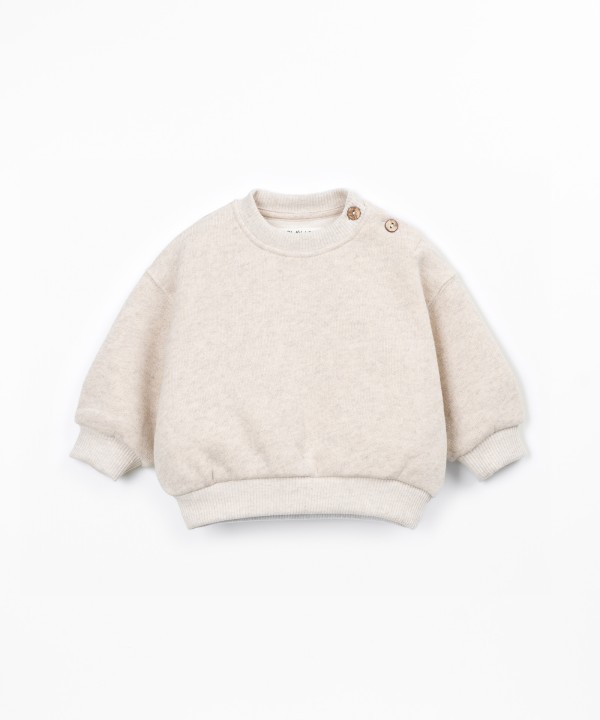 Knit sweater with recycled cotton