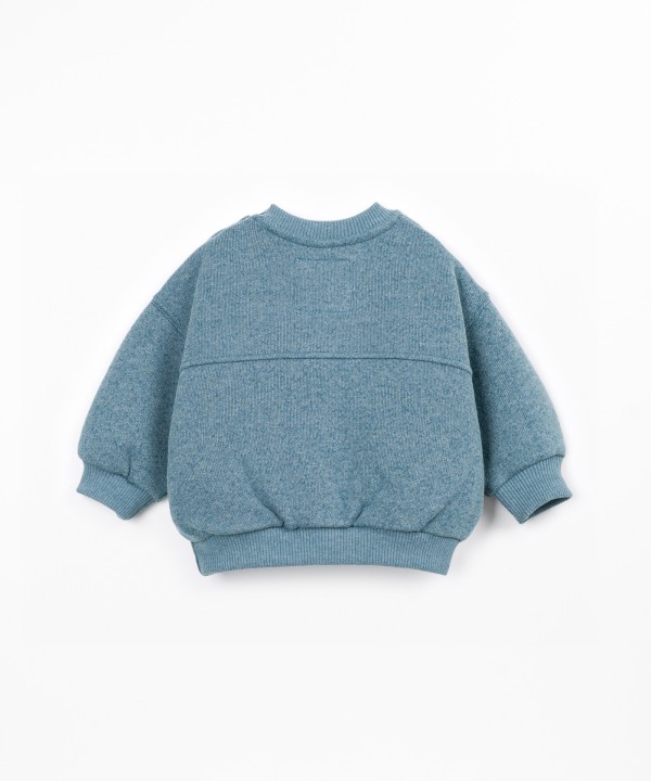 Knit sweater with recycled cotton