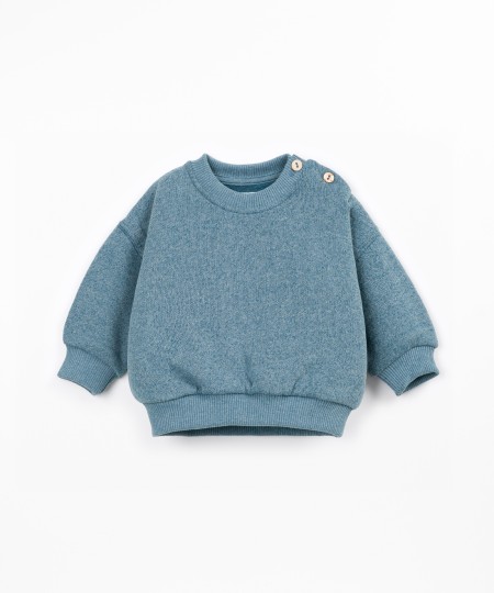 Knit sweater with recycled cotton