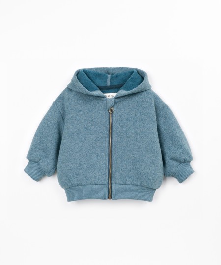 Knitted jacket with a blend of cotton and recycled fibers