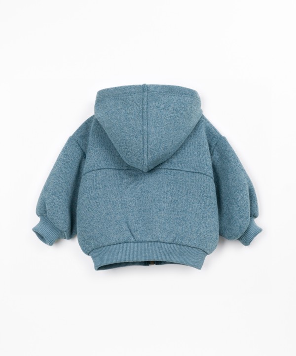 Knitted jacket with a blend of cotton and recycled fibers