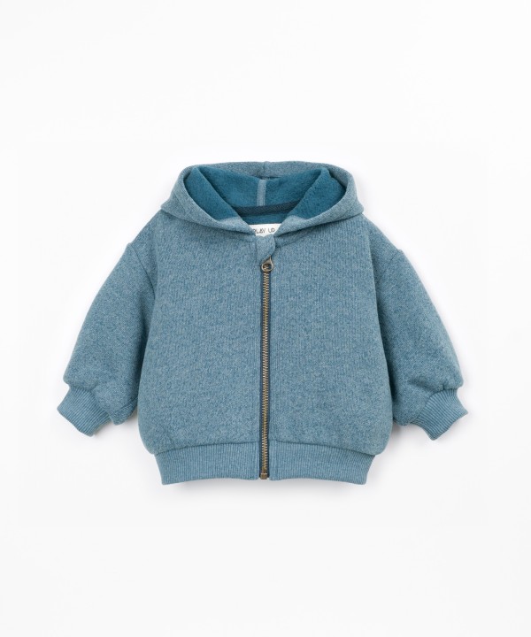 Knitted jacket with a blend of cotton and recycled fibers