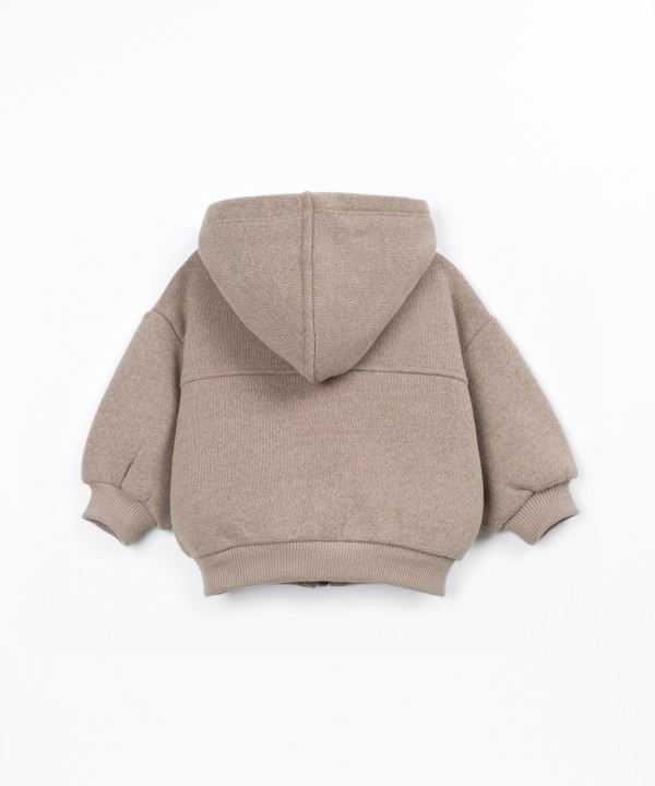 Knitted jacket with a blend of cotton and recycled fibers