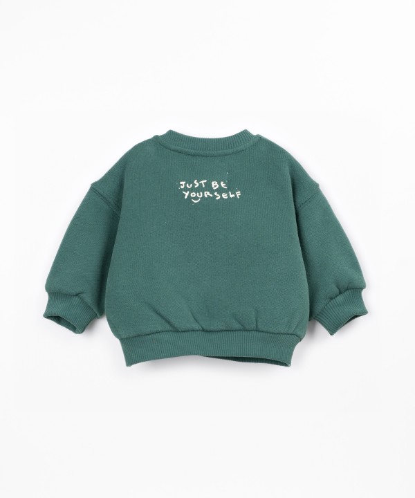 Knitted sweater with brushed interior