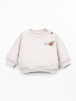 Knitted sweater with interior carding