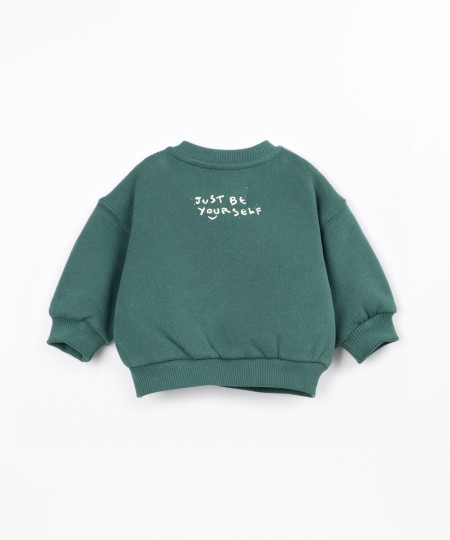Knitted sweater with brushed interior