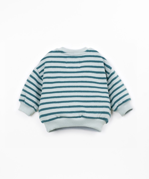 Sweater with a mix of natural and recycled fibers