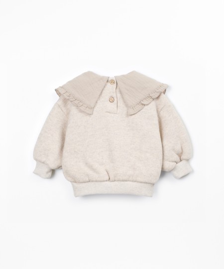 Sweater with a mix of natural and recycled fibers