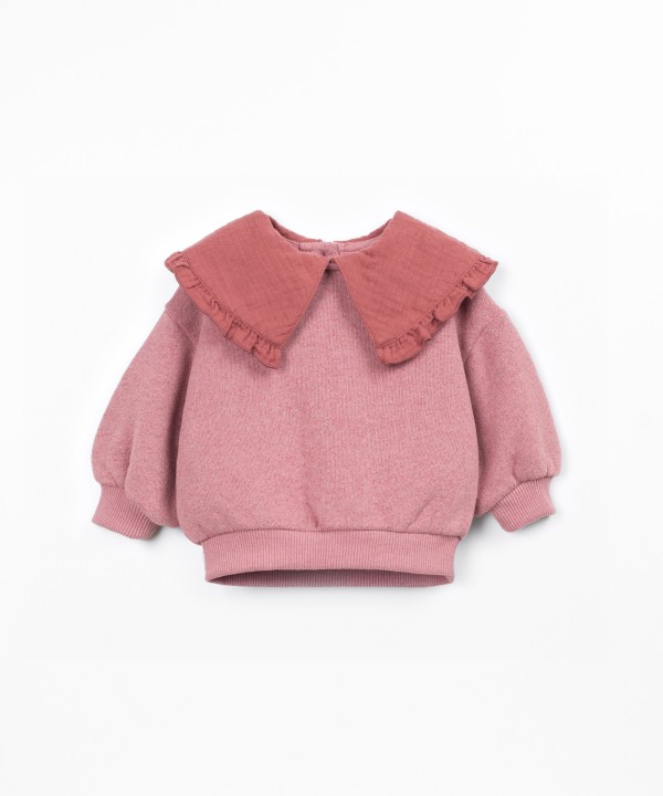 Sweater with a mix of natural and recycled fibers
